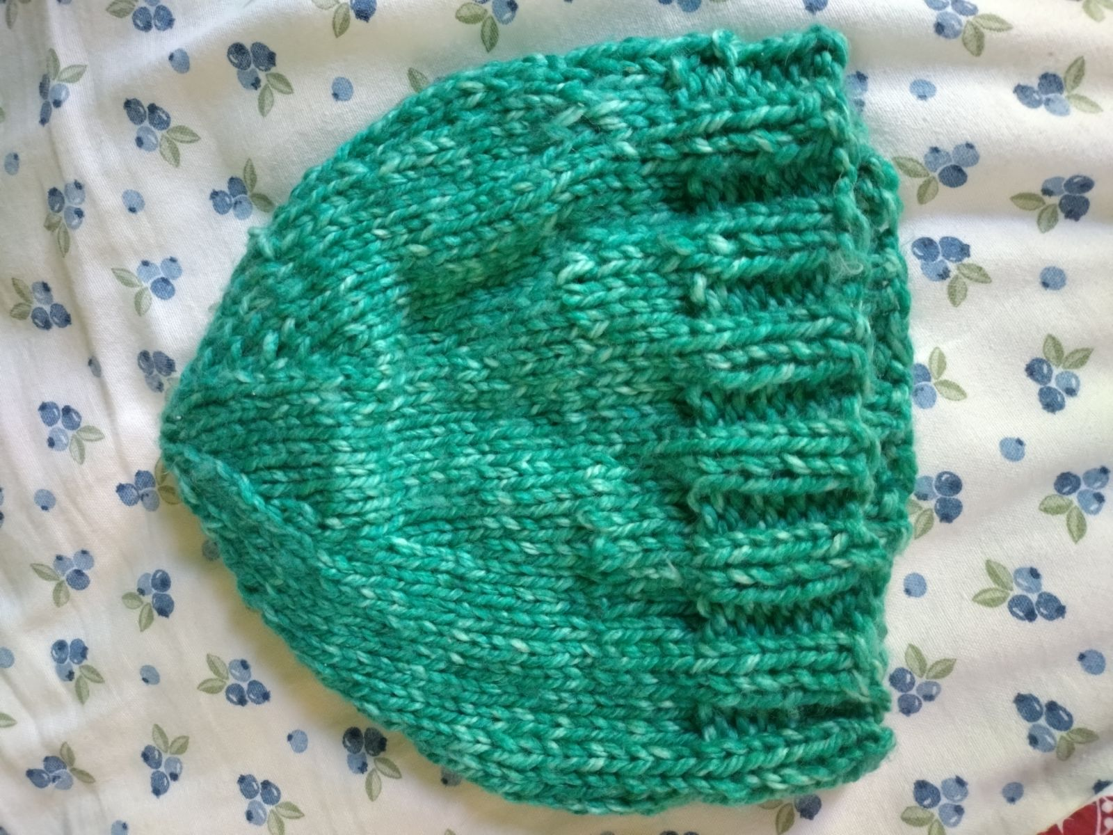 a teal beanie knit according to the above pattern